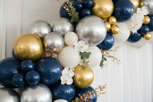 Luxurious chrome foil and double-stuffed balloon garland in navy gold and white